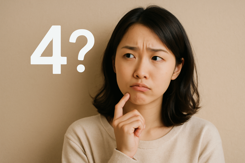 なぜ「4」はネガティブな意味なのか疑問に思っている女性の画像
